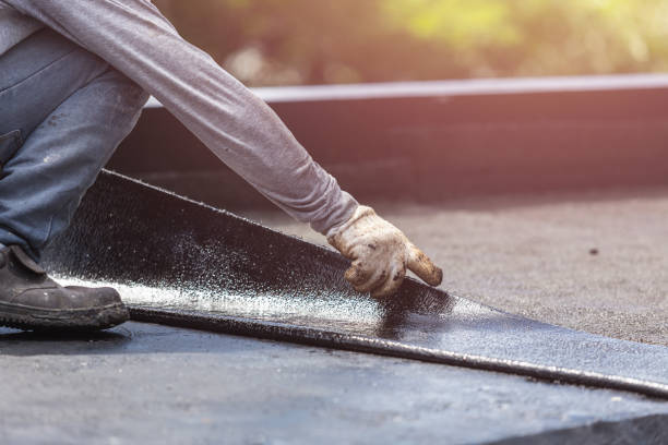 Professional Emergency Waterproofing technician working in Monroe Township, NJ